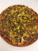 This is one of our best selling Chicago style thin crust pizzas.  Sausage & Mushrooms.  Shown with pesto on top.